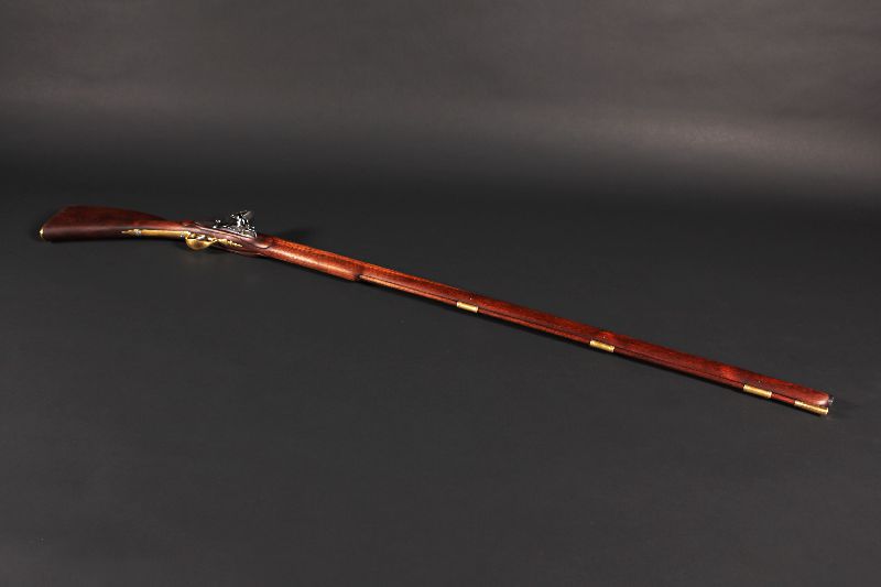 A replica of a long-barreled musket.