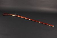A replica of a long-barreled musket.