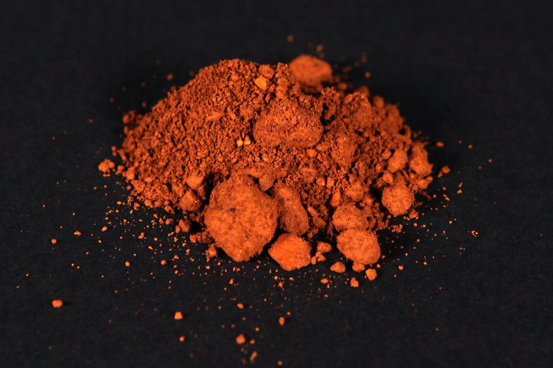 Orange-coloured powdered ochre.
